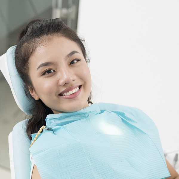 Woman at the dentist smiling