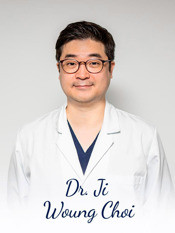 Dr. Choi wearing his white coat